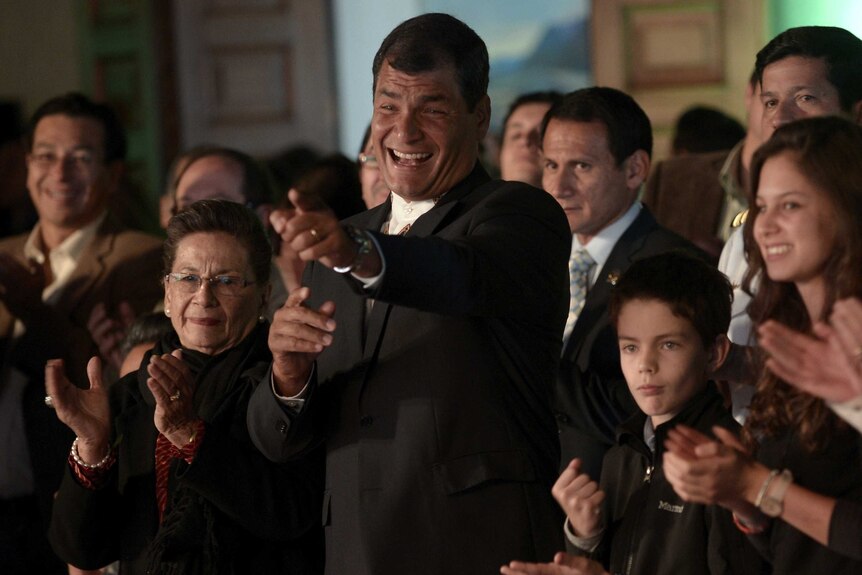 Ecuadorean president Rafael Correa celebrates re-election