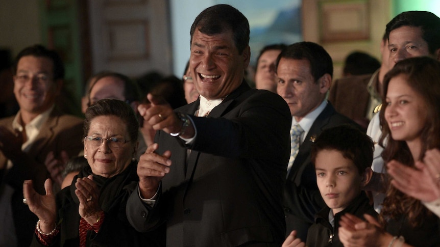 Ecuadorean president Rafael Correa celebrates re-election