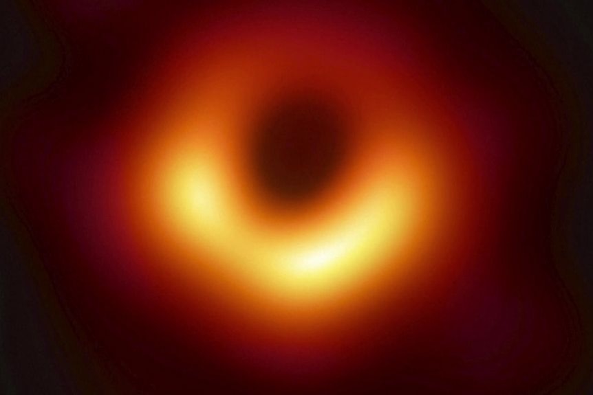 Fuzzy picture of a red circular hole 