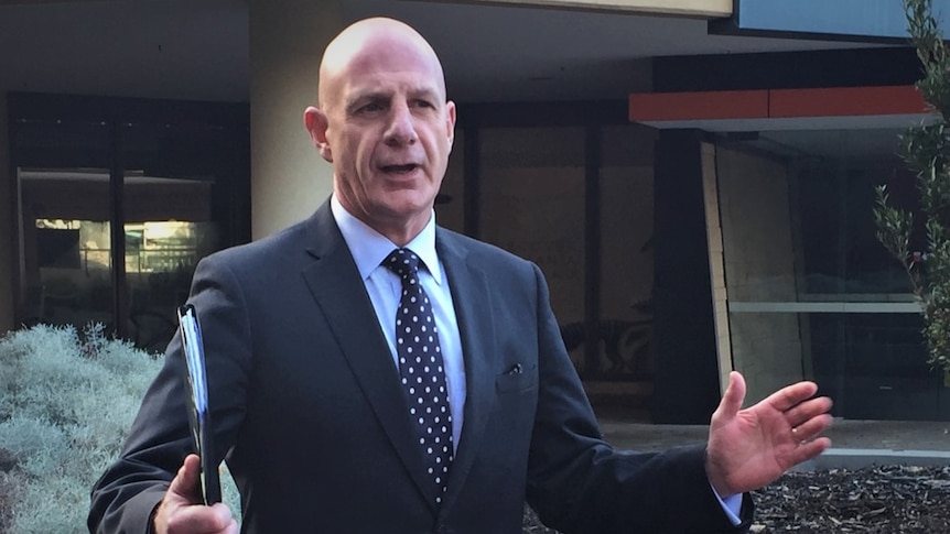 Peter Gutwein, Tasmanian Liberal politician, stands outside ABC News, Hobart, undated image.