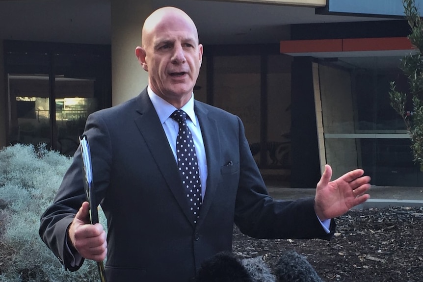 Peter Gutwein, Tasmanian Liberal politician, stands outside ABC News, Hobart, undated image.