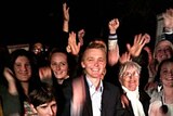 Wyatt Roy, celebrates with supporters after winning the seat of Longman.