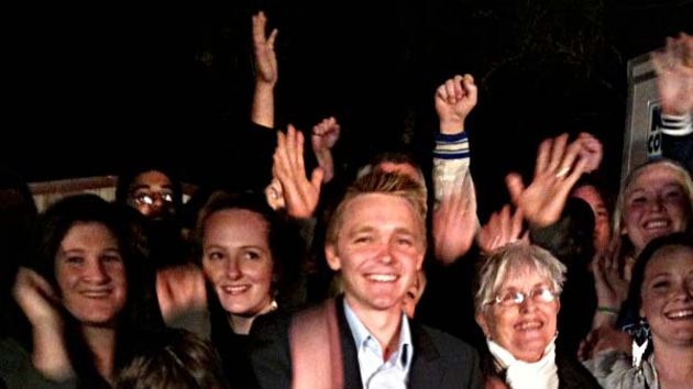 Wyatt Roy, celebrates with supporters after winning the seat of Longman.