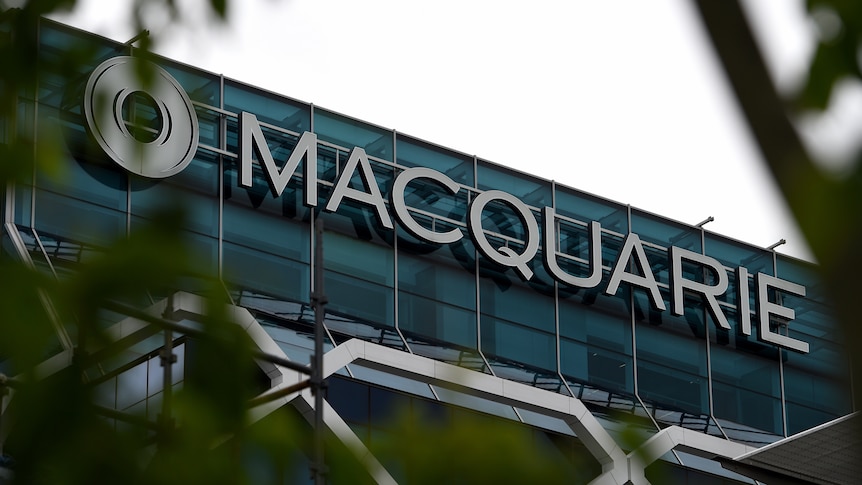 A Macquarie Bank sign on a modern office building