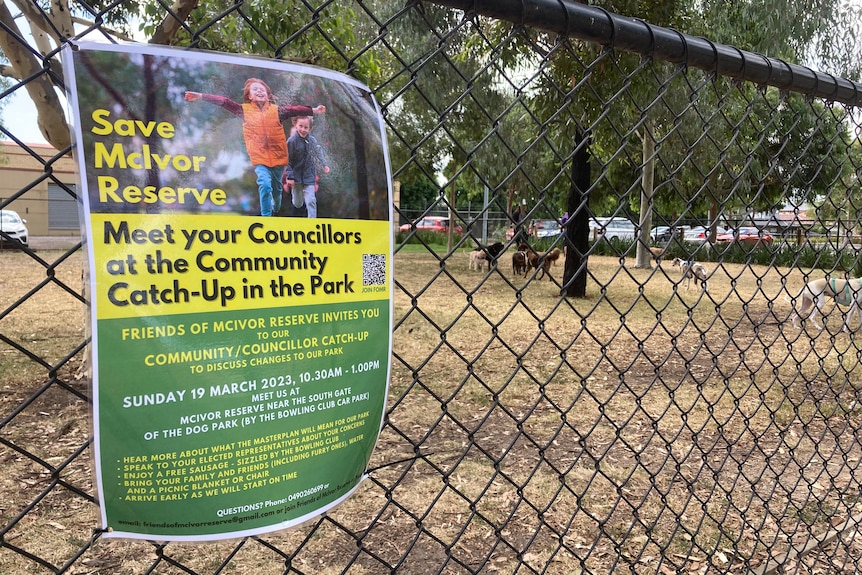 A sign on a chainlink fence that reads 'Save McIvor Reserve'