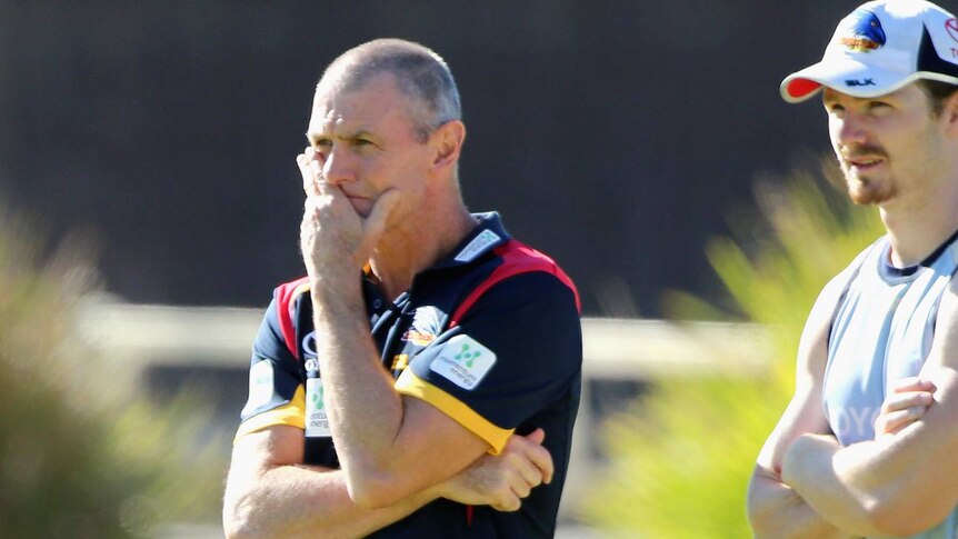 Phil Walsh watches training