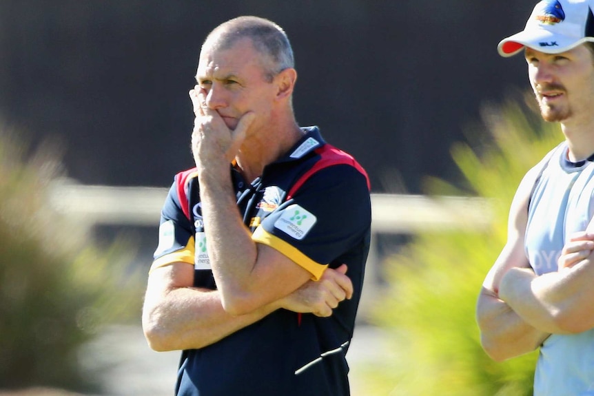 Phil Walsh watches training