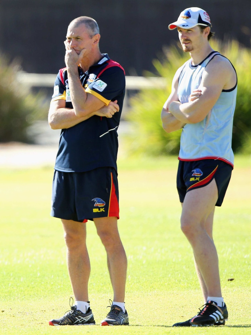 Phil Walsh watches training