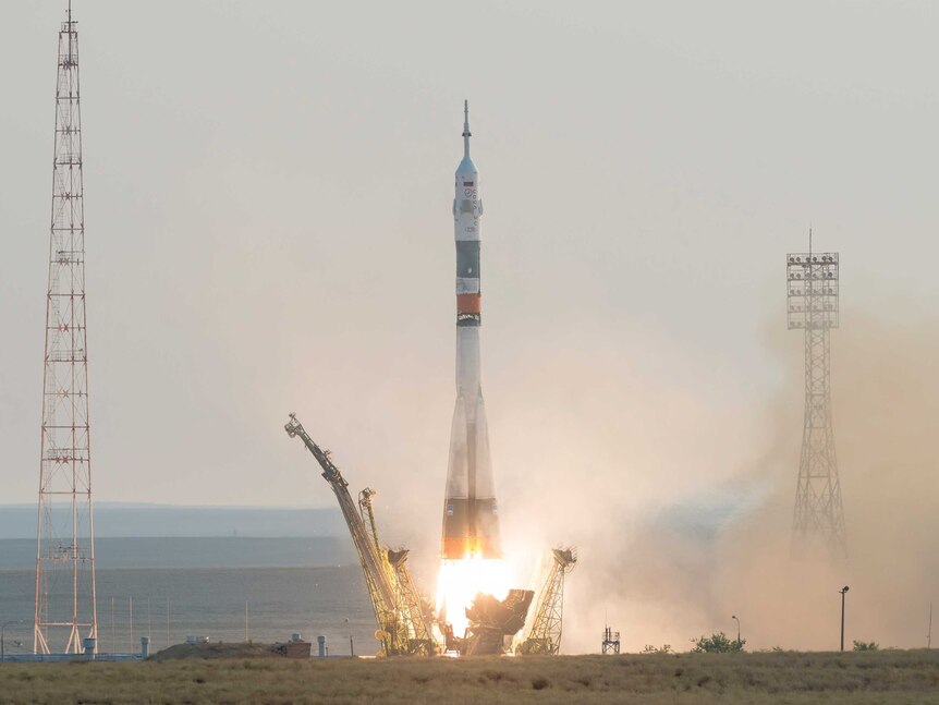 The Soyuz MS-01 spacecraft launches from the Baikonur Cosmodrome in Kazakhstan