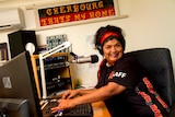 Chrissy Bond at the controls of the Us Mob FM radio studio.