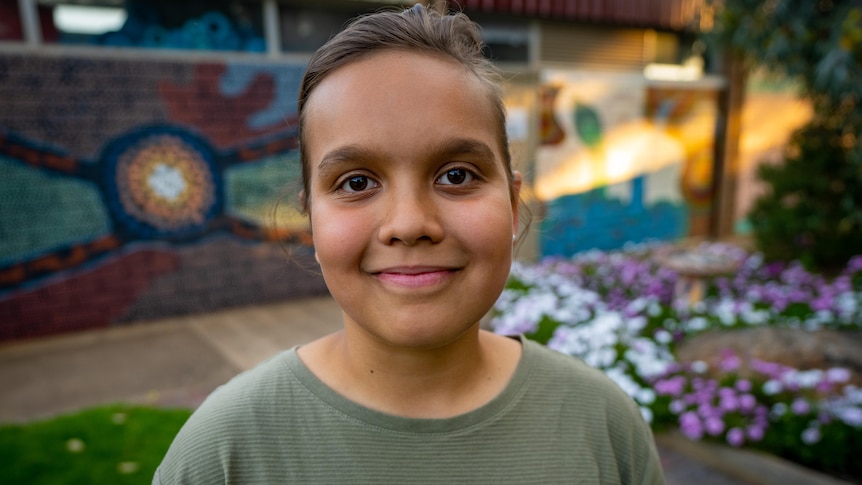 A young Aboriginal girl smiling