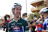 Kaden Groves stands by his bike after winning a stage of La Vuelta a Espana.