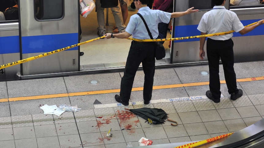 Police at scene of Taiwan subway stabbing