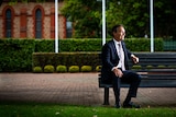 Steven Marshall sits and smiles.