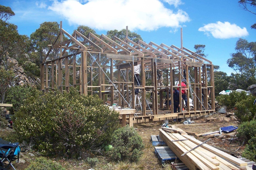 Volunteers rebuilding one of Tasmania's iconic mountain huts