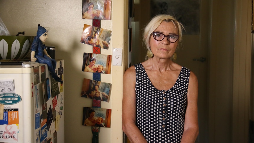 A woman in her kitchen.