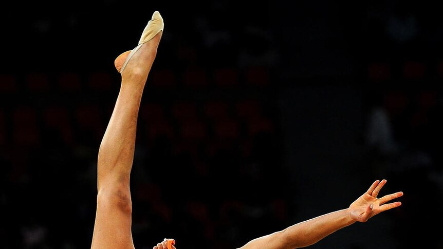Australia's Naazmi Johnston competes in the rhythmic gymnastics on her way to team gold