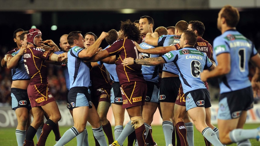 A brawl erupts during the first half of State of Origin One