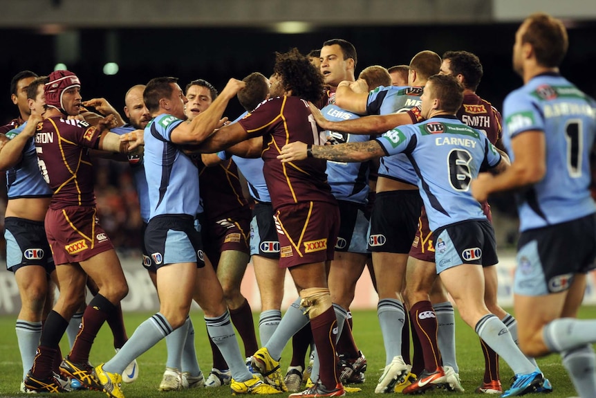A brawl erupts during the first half of State of Origin One