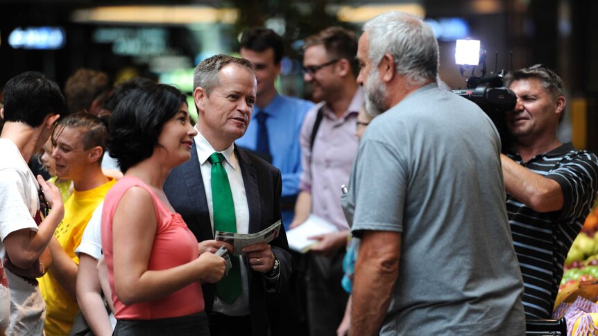 Labor leader Bill Shorten and the party's Griffith candidate Terri Butler visit a shopping centre in Brisbane.