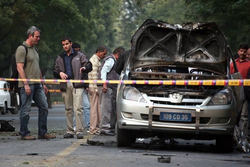 Embassy car destroyed by magnet bomb