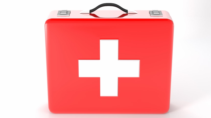 Red with white cross first aid kit on white background 