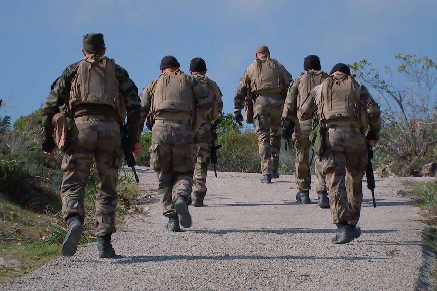 Legionnaires of the 2nd Foreign Parachute Regiment on the march.