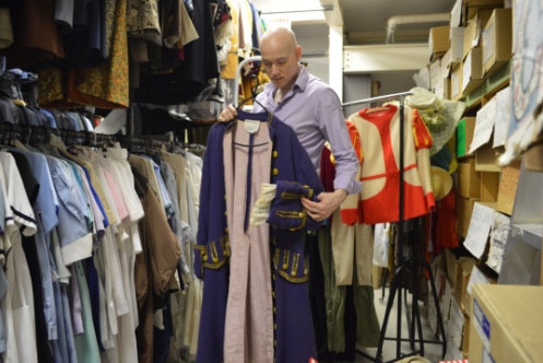 Andrew Best holds a blue jacket that is believed to featured in the show 'Adventure Island'.