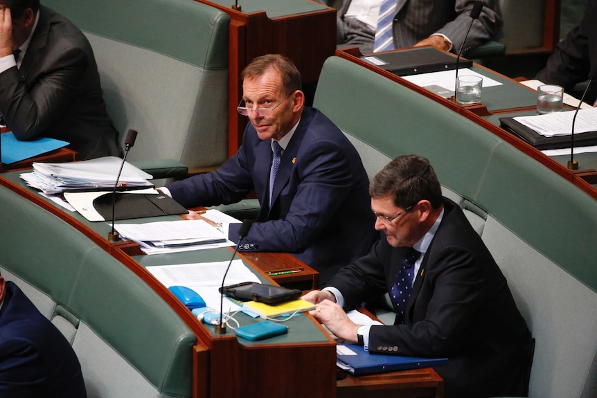 Tony Abbott sits among the back benchers during Question Time on August 31, 2016