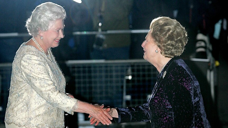 Margaret Thatcher greets Queen Elizabeth II in 2005.