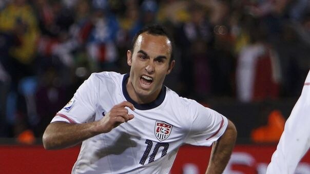 Landon Donovan sent USA top above England in Group C with his injury-time winner.