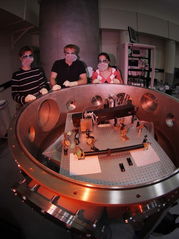 Professor Daniel Shaddock  and colleagues preparing to test the GRACE Follow-on retroreflector
