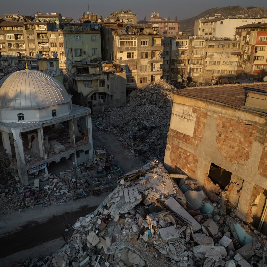 rubble, collapsed buildings and mosque