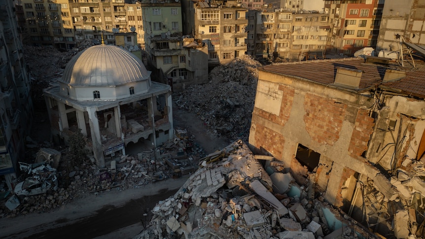 rubble, collapsed buildings and mosque