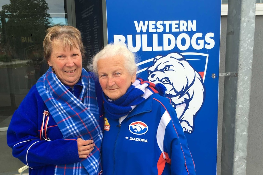 Devoted fans ... Angie Collins and her mother, who have supported the Bulldogs for more the 40 years, at Whitten Oval