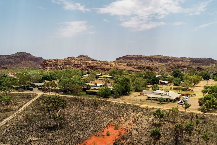 several buildings in an outback setting