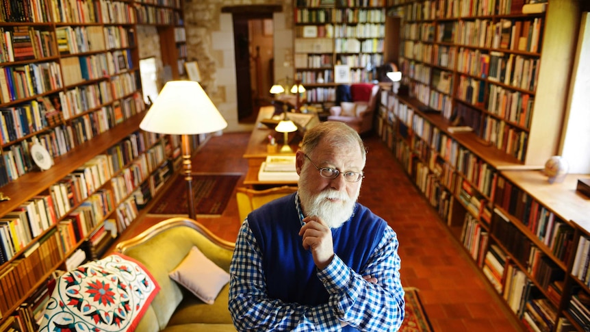 Alberto Manguel in his personal library.