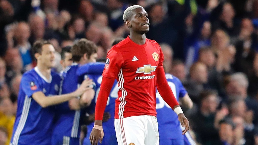Paul Pogba grimmaces after loss to Chelsea