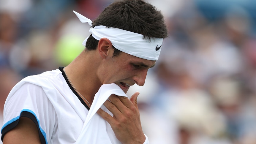 Tomic no match for Federer