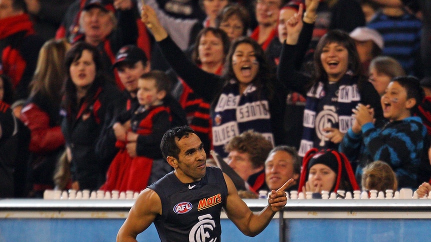 Eddie Betts signals to the crowd after kicking one of five goals against the Bombers at the MCG.
