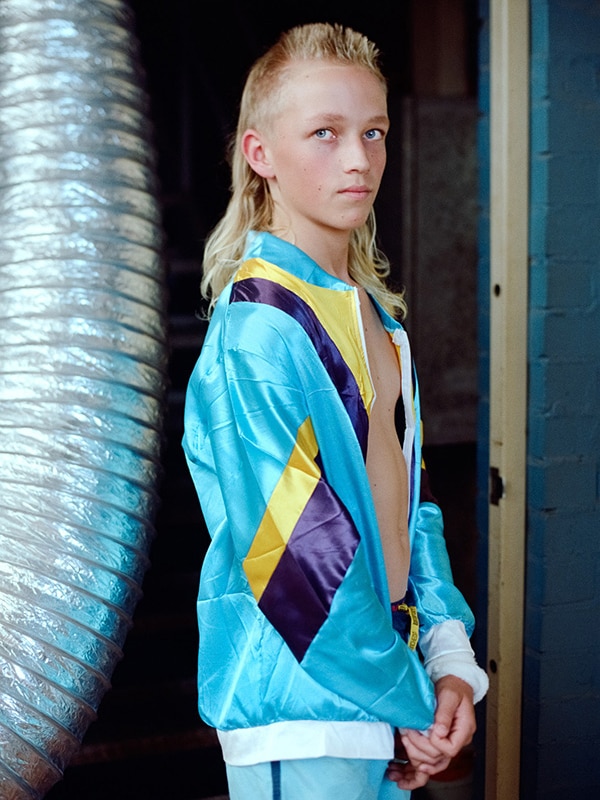 A man wearing a mullet.