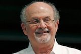 Salman Rushdie smiles