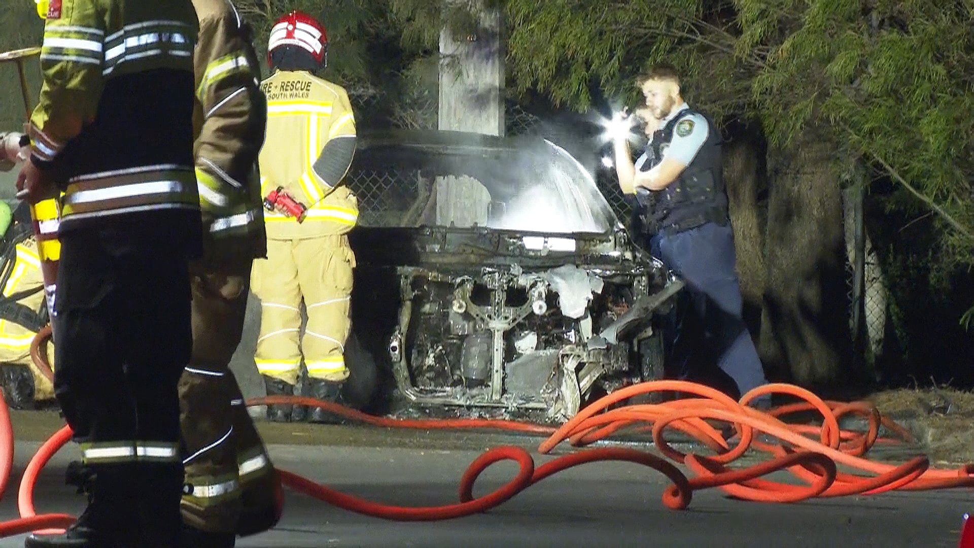 NSW Police and Fire and Rescue NSW crews at Welfare Avenue, Beverley Hills after a car was set alight
