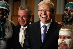 Kevin Rudd and Brendan Nelson pose with Aboriginal performers after an Aboriginal welcoming ceremony on the eve of the formal...