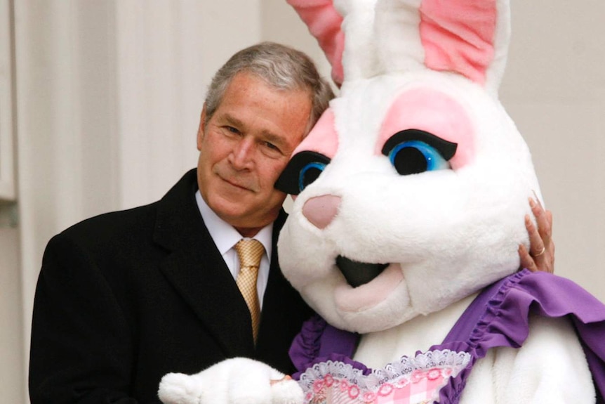 Former US president George Bush hugging the Easter bunny at the 2008 Easter Egg Roll.