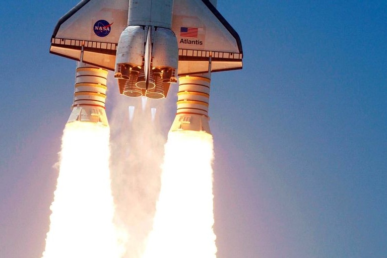 Space shuttle Atlantis soars to orbit
