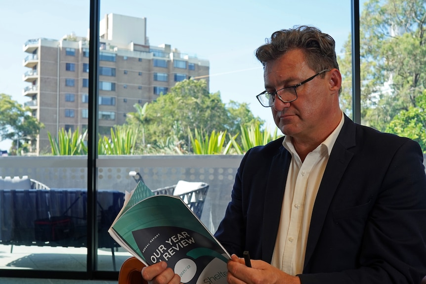 A man reading a book.