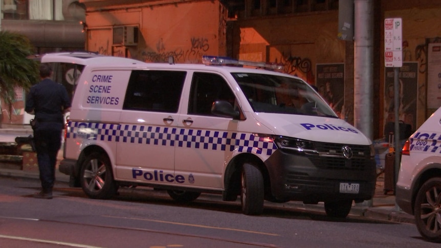 A Crime Scene Services van on a road in the early hours of the morning.
