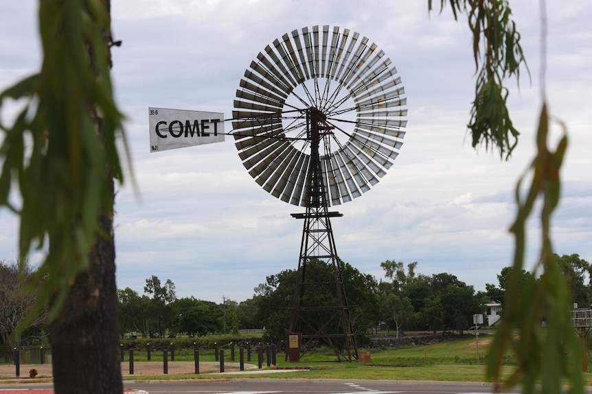 A large windmill in a country town