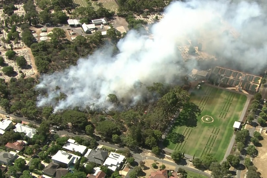 An aerial shot of smoke burning from a bushfire  